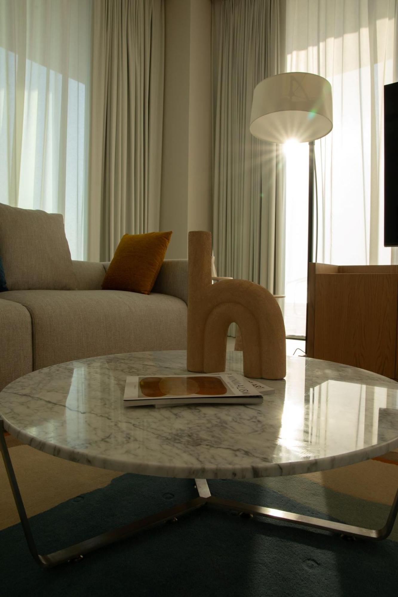 فندق عجمان المظهر الخارجي الصورة A 3D rendering of a living room